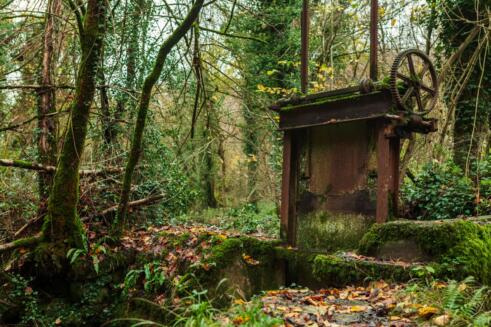 Old Sluice gate at the abandoned Fussells iron works in Mells, Somerset, Uk